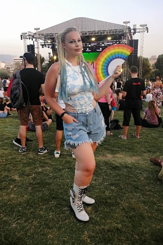 White Patterned Corset Top + Ripped Denim Shorts + White Lace-up Boots