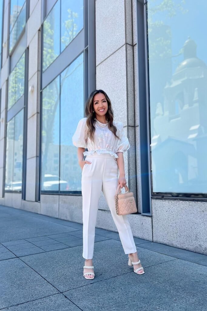 White Puff-Sleeve Organza Top + White High-Waisted Trousers + Beige Quilted Handbag + White Braided Heeled Sandals