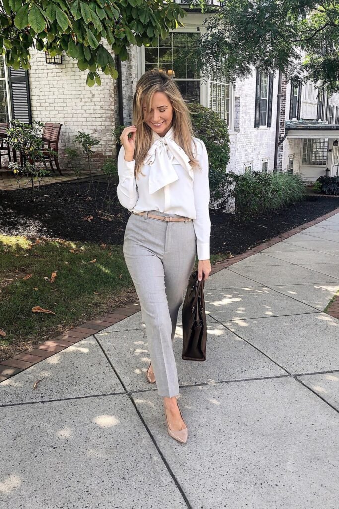White Pussy-Bow Blouse + Grey Slim-Fit Trousers + Nude Pointed-Toe Pumps