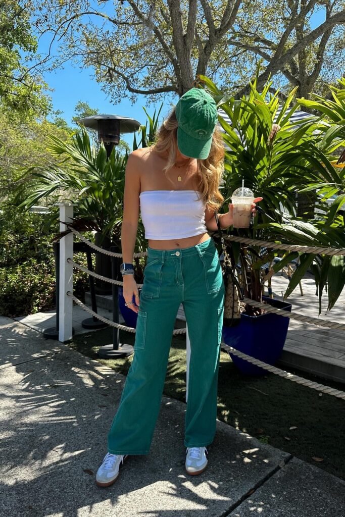 White Ribbed Bandeau Top + Green Utility Cargo Pants + Green Baseball Cap + White Sneakers