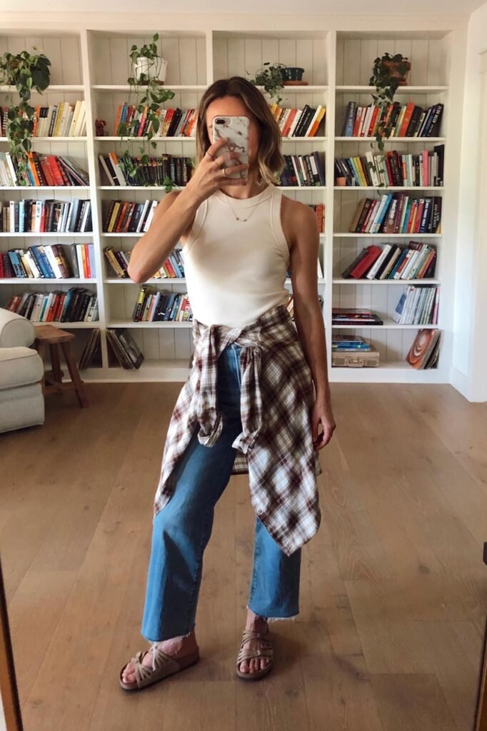 White Ribbed Tank Top + Plaid Flannel Shirt (tied at waist) + Wide-Leg Denim + Tan Buckle Sandals