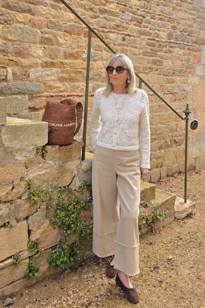 White Textured Lace Jacket + Beige Wide-Leg Raw-Hem Trousers + Brown Ballet Flats