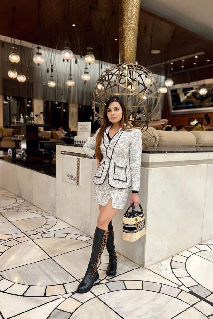 White Tweed Skirt Suit with Black Trim + Black Knee-High Monogram Boots