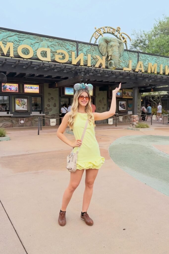 Yellow Ruffle Mini Dress + Sequin Minnie Ears + Beige Crossbody Bag + Brown Athletic Shoes