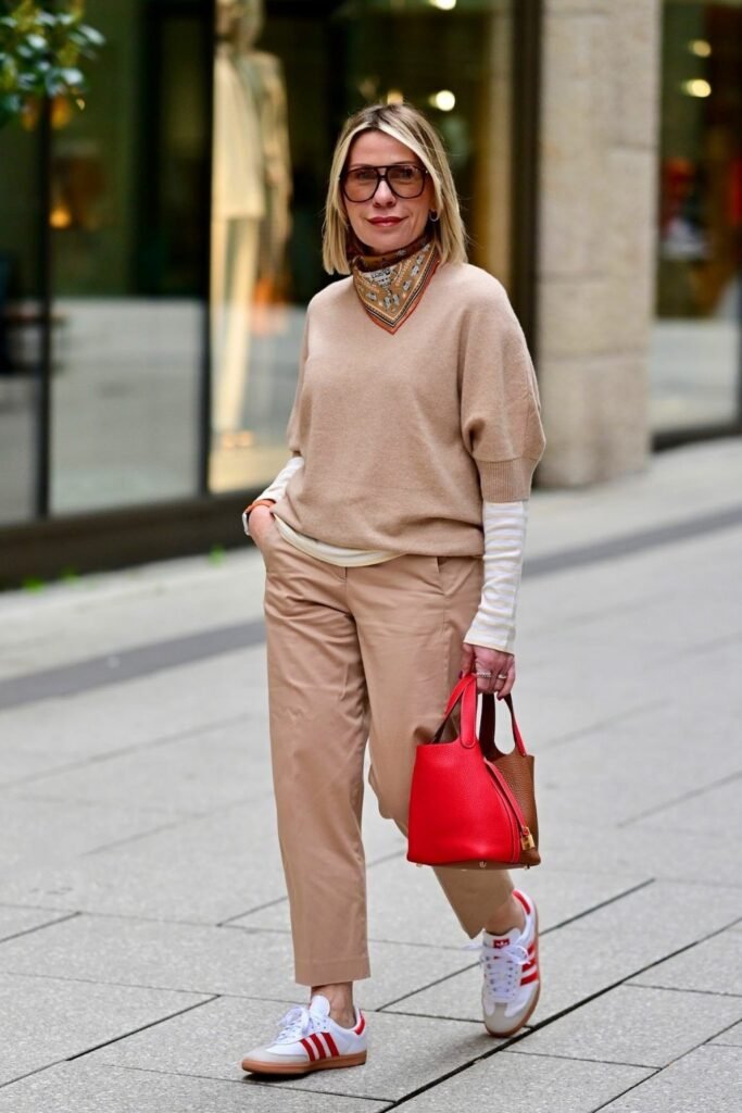 Beige Short Sleeve Sweater + Striped Long Sleeve Layer + Camel Chinos + White Sneakers