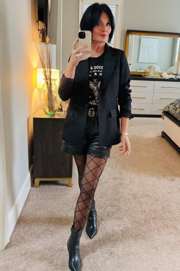 Black Blazer + Graphic T Shirt + Black Leather Shorts + Patterned Tights + Ankle Boots