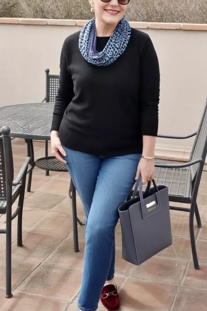 Black Crewneck Sweater + Blue Skinny Jeans + Blue Leopard Print Infinity Scarf + Burgundy Velvet Loafers