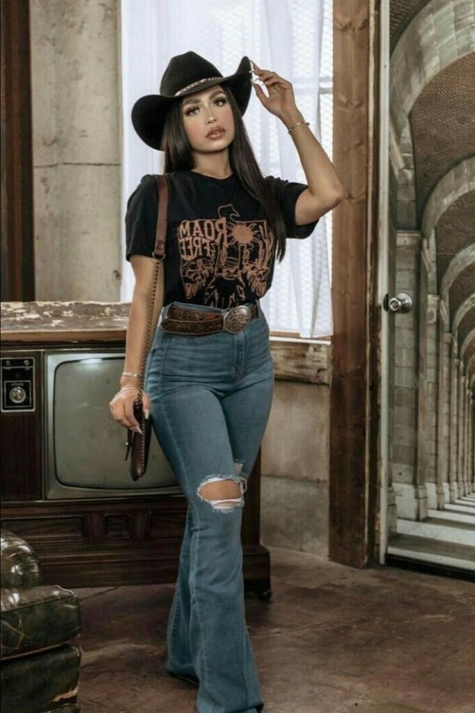Black Graphic T Shirt + Light Wash Distressed Flared Jeans + Black Western Hat