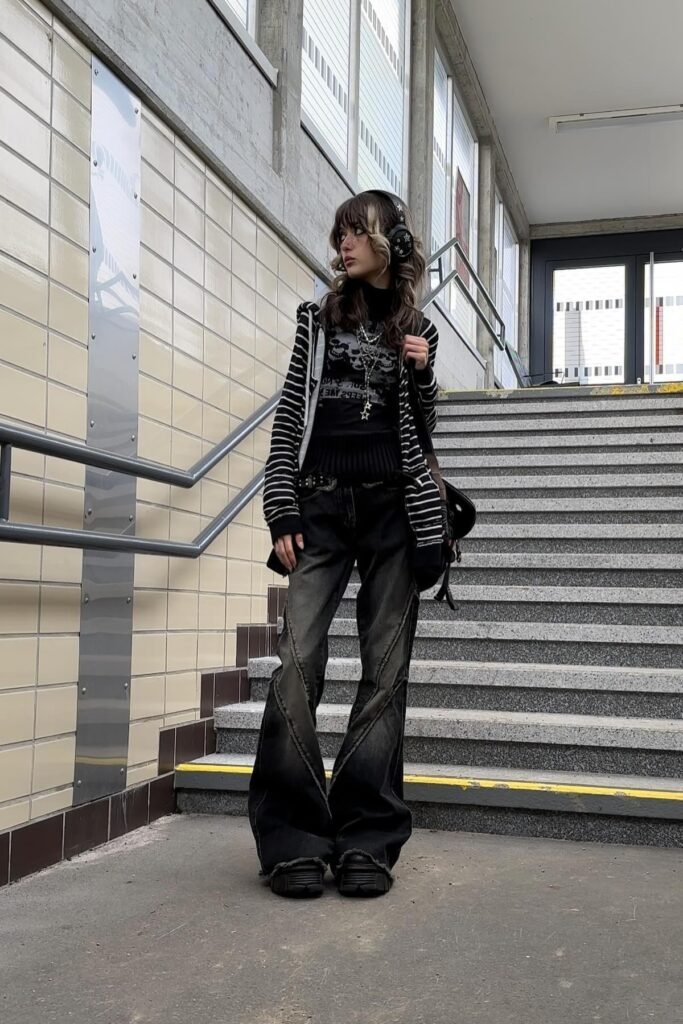 Black Graphic Top + Black and White Striped Cardigan + Over sized Dark Wash Jeans + Chunky Black Shoes