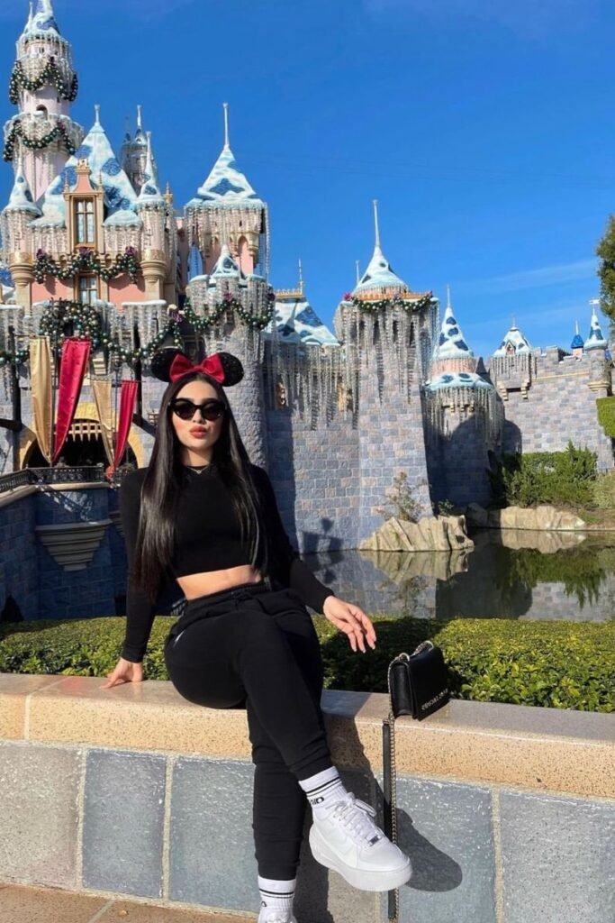 Black Long Sleeve Crop Top + Black Joggers + Red Minnie Mouse Ears + White Sneakers