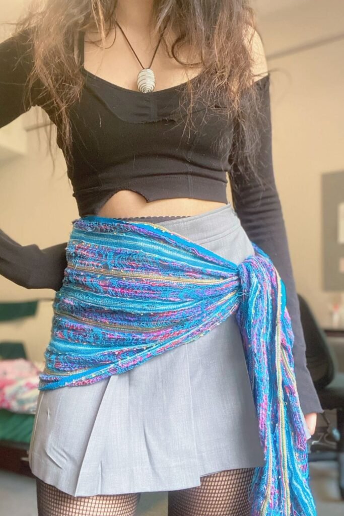 Black Long Sleeve Crop Top + Grey Pleated Mini Skirt + Blue Textured Scarf Belt