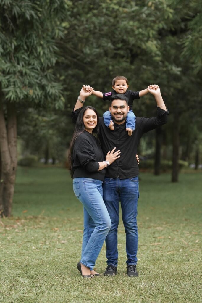 Black Long Sleeve Shirt + Blue Jeans + Black Flats (Mother) / Black Button Down Shirt + Blue Jeans + Black Sneakers (Father) / Black T Shirt + Blue Jeans (Son)