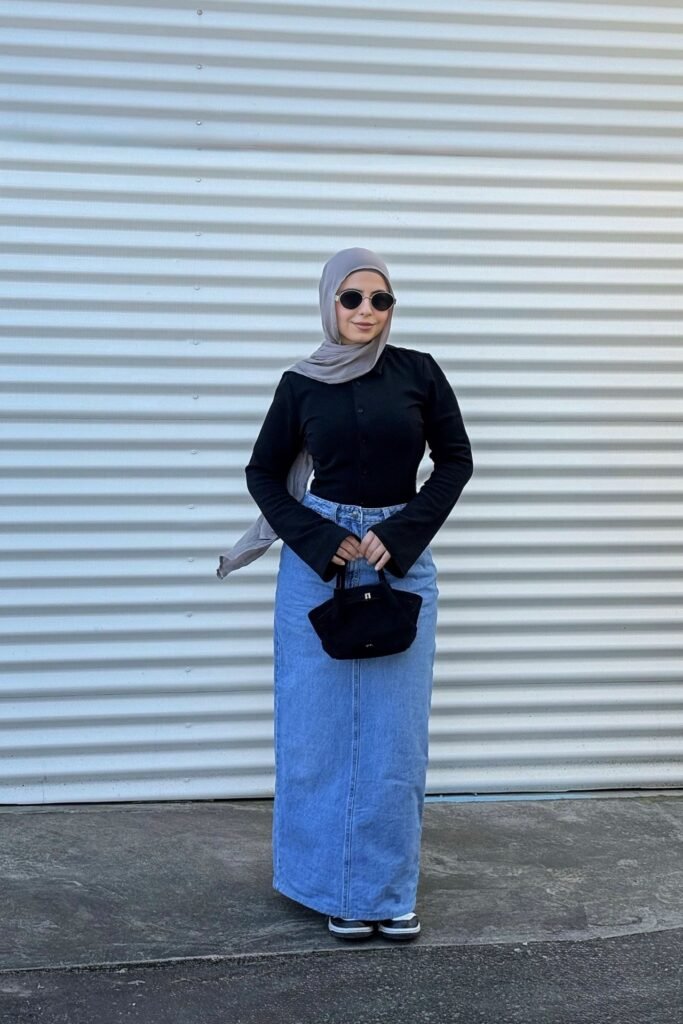 Black Long Sleeve Shirt + Medium Wash Denim Maxi Skirt + Black and White Sneakers