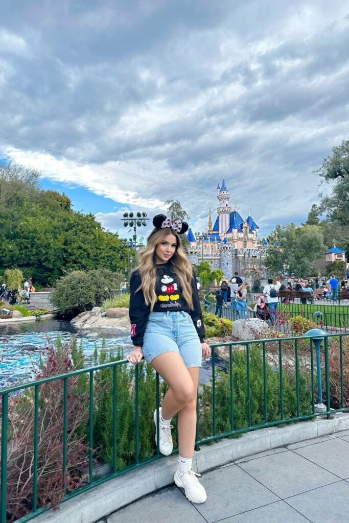 Black Mickey Mouse Sweatshirt + Light Wash Denim Shorts + White Chunky Sneakers