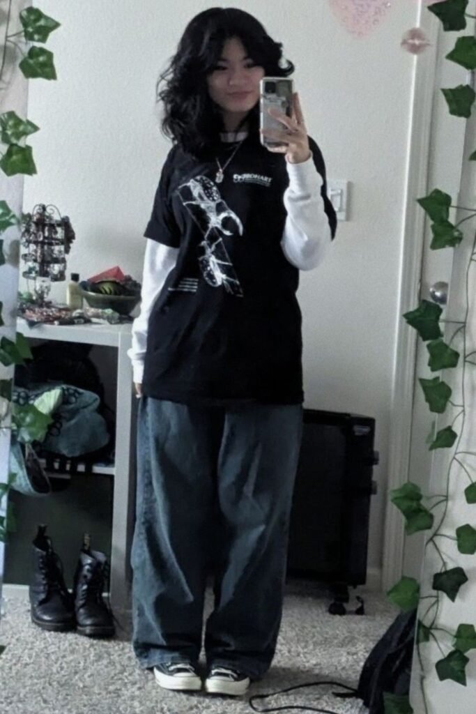 Black Oversized Graphic Tee + White Long Sleeve Layer + Baggy Grey Jeans + Black and White Sneakers
