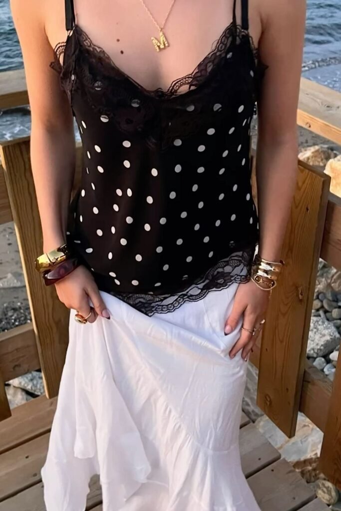 Black Polka Dot Lace-Trim Camisole + White Ruffle Maxi Skirt + Chunky Gold Jewelry