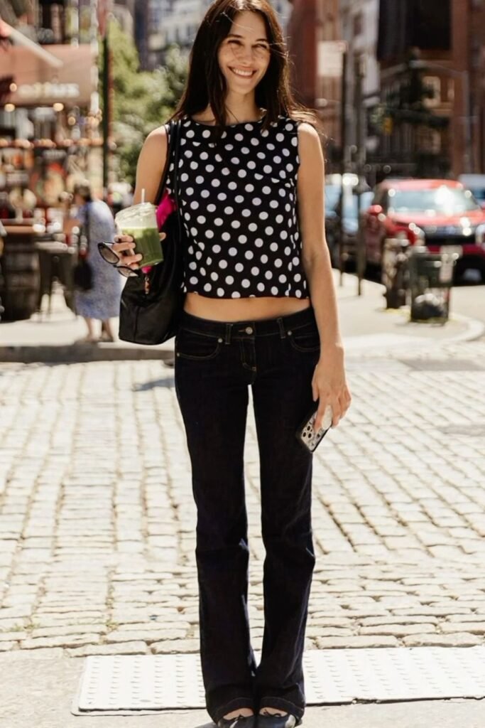 Black Polka Dot Sleeveless Crop Top + Dark Wash Flare Jeans + Black Flats