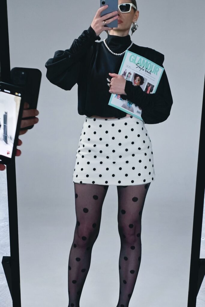 Black Puff-Sleeve Blouse + White Polka Dot Skirt + Polka Dot Tights