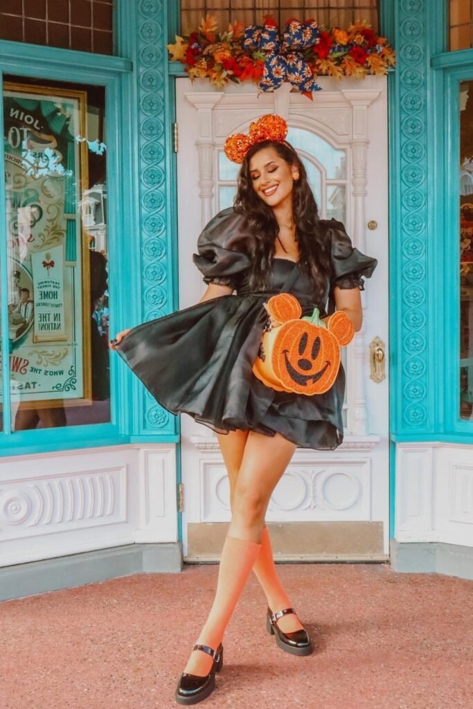 Black Puffy Sleeve Mini Dress + Orange Knee High Socks + Mickey Pumpkin Bag + Black Mary Janes
