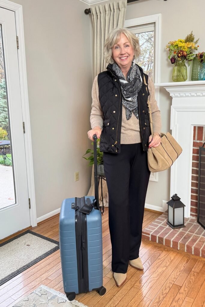 Black Quilted Vest + Taupe Crewneck Sweater + Black Wide Leg Trousers + Beige Pointed Booties