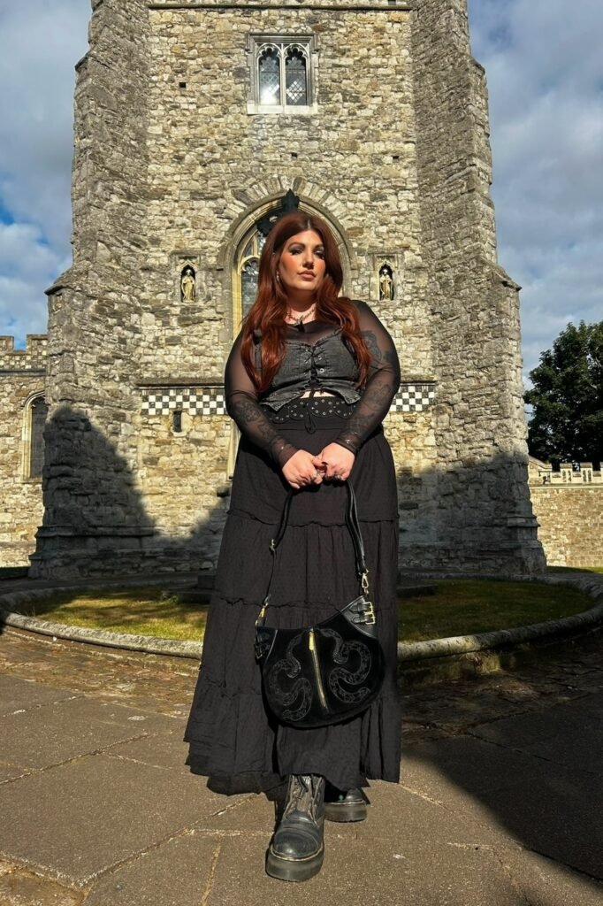 Black Sheer Long Sleeve Top + Denim Corset Vest + Black Tiered Maxi Skirt + Black Platform Boots