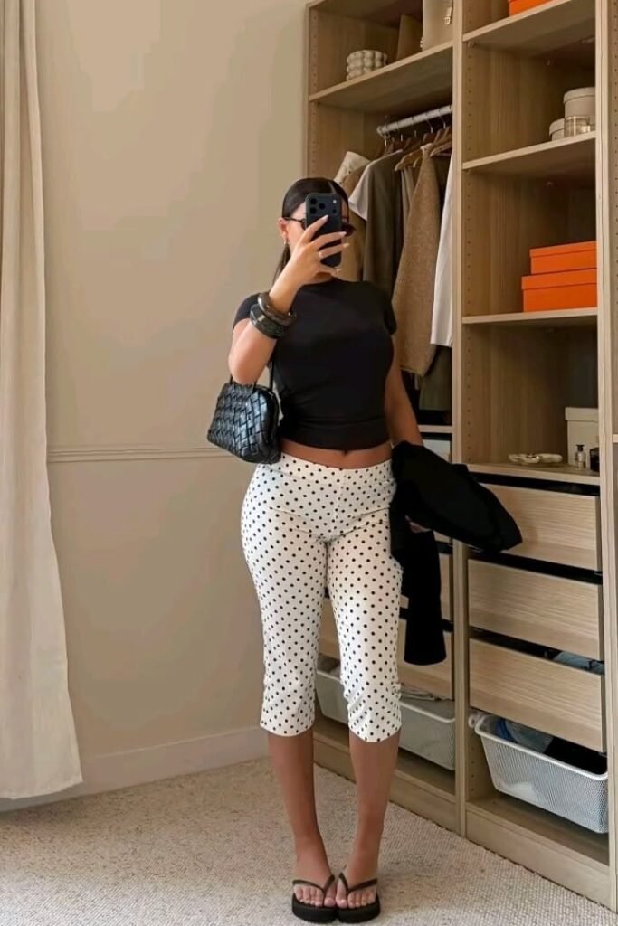 Black Short Sleeve T Shirt + White Polka Dot Capri Pants + Black Woven Handbag + Black Platform Thong Sandals