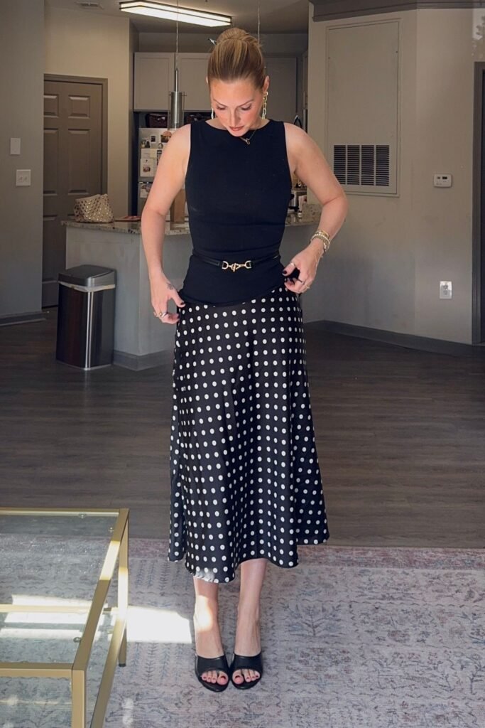 Black Sleeveless Boat Neck Top + Thin Black Belt + Black Polka Dot Satin Midi Skirt + Black Square Toe Mules