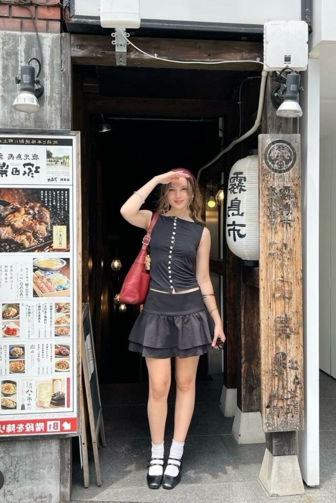 Black Sleeveless Button Up Top + Black Ruffled Mini Skirt + White Socks + Black Mary Jane Shoes