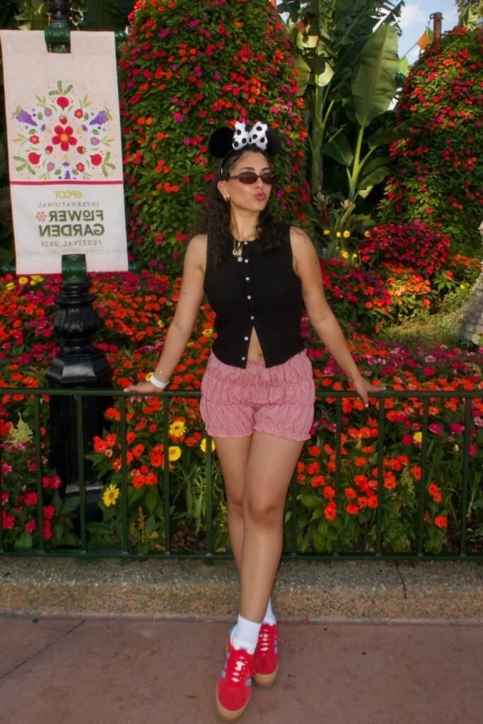 Black Sleeveless Button Up Top + Pink Gingham Ruffled Shorts + Red Sneakers
