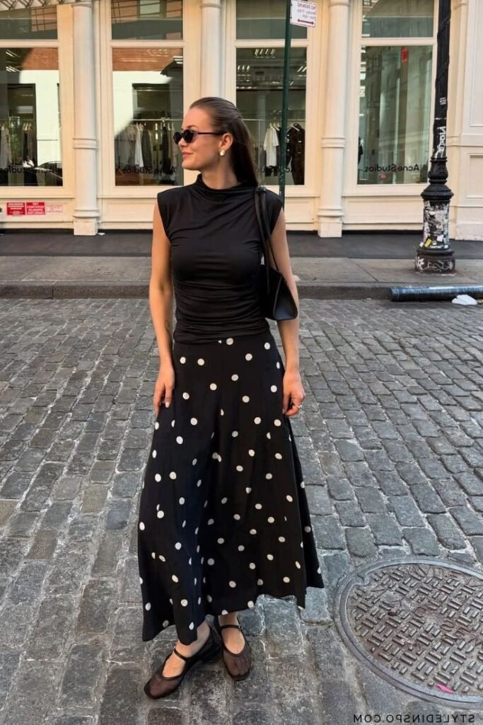 Black Sleeveless Mock Neck Top + Black Large Polka Dot Maxi Skirt + Black Mesh Mary Janes