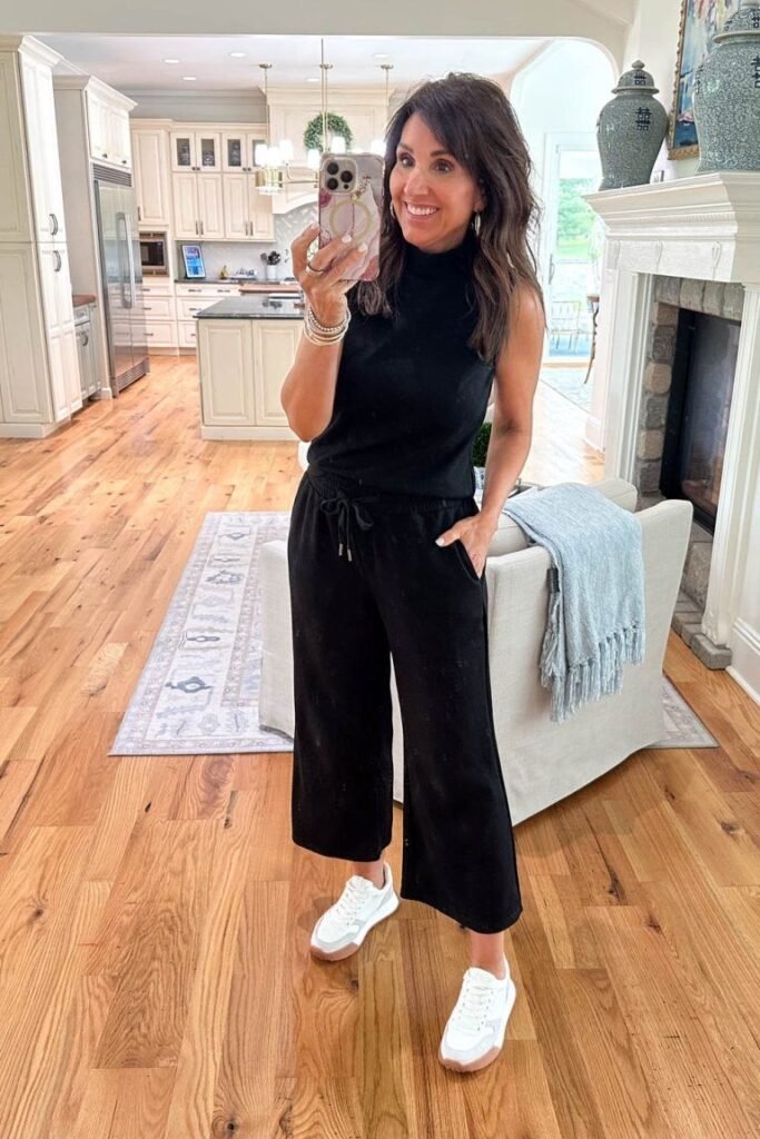 Black Sleeveless Mock Neck Top + Black Wide Leg Cropped Pants + White Sneakers