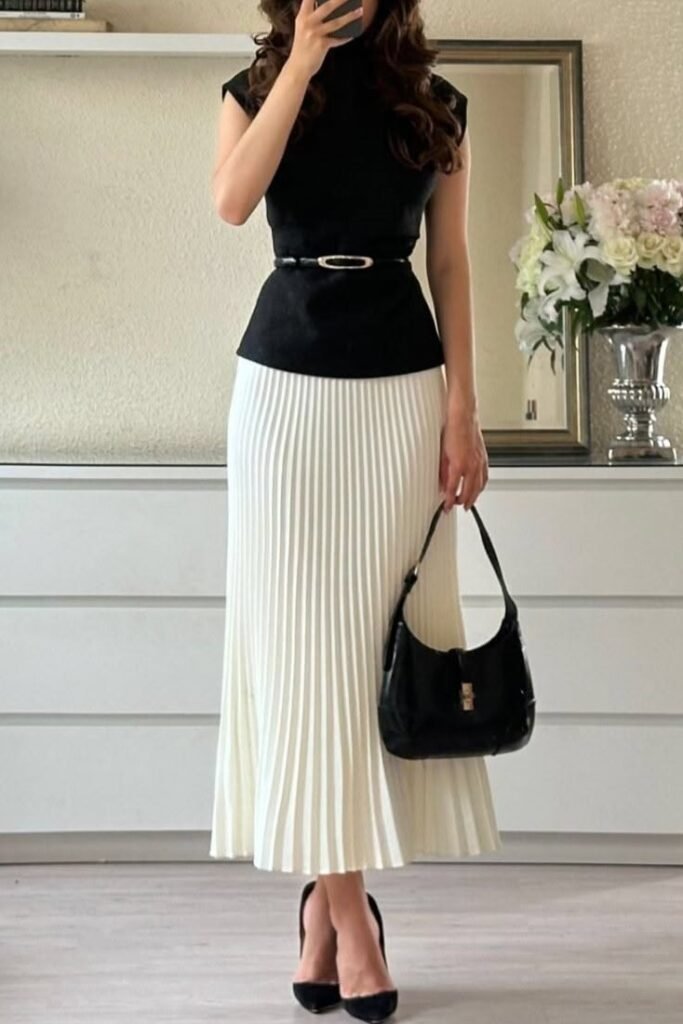 Black Sleeveless Top + White Pleated Midi Skirt + Black Handbag