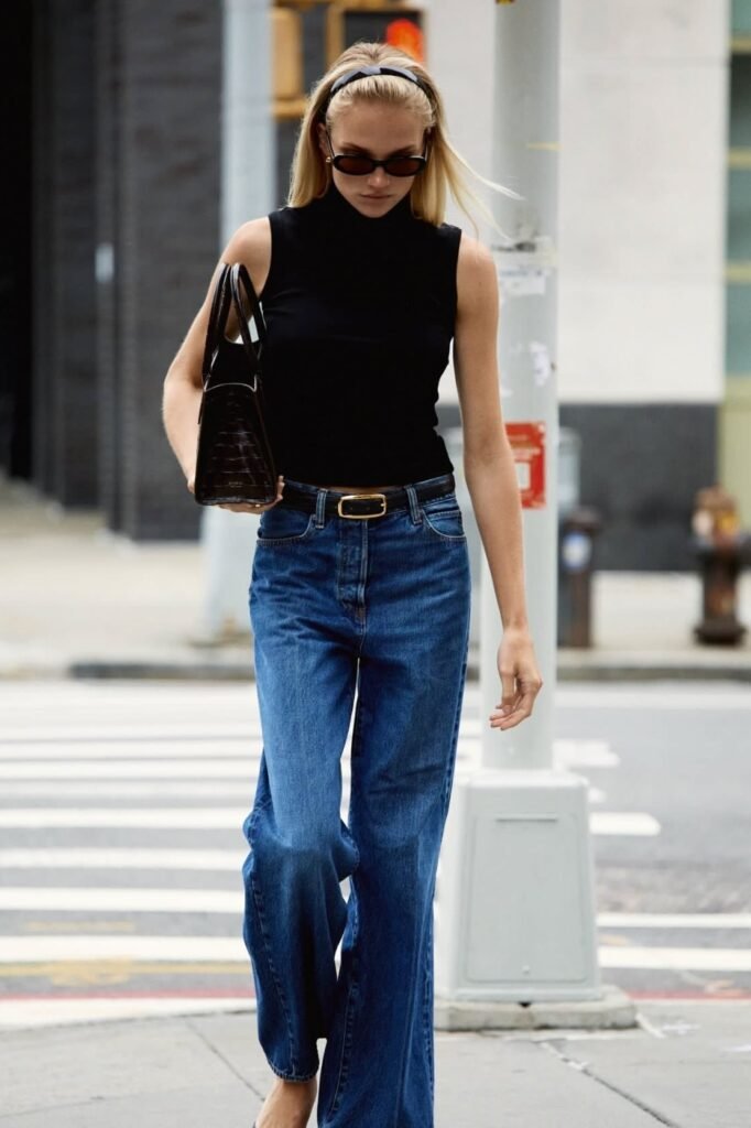Black Sleeveless Turtleneck + Dark Wash Wide-Leg Jeans + Black Headband