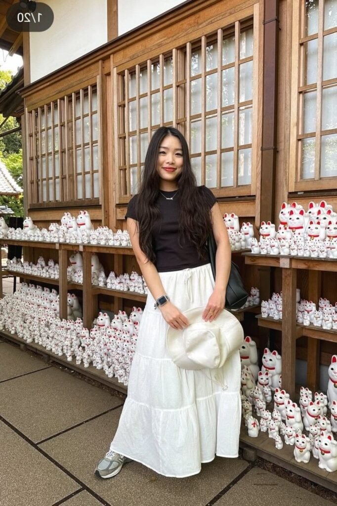Black T Shirt + White Tiered Maxi Skirt + White Bucket Hat + Grey Sneakers