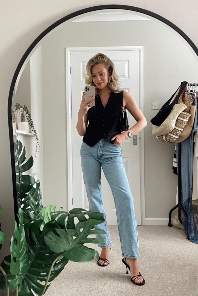 Black Tailored Vest + Light Wash Straight Jeans + Black Heeled Sandals