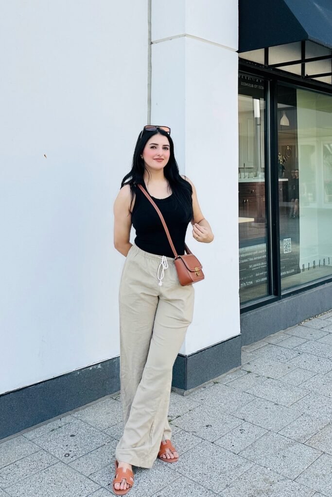Black Tank Top + Beige Drawstring Trousers + Tan Flat Sandals