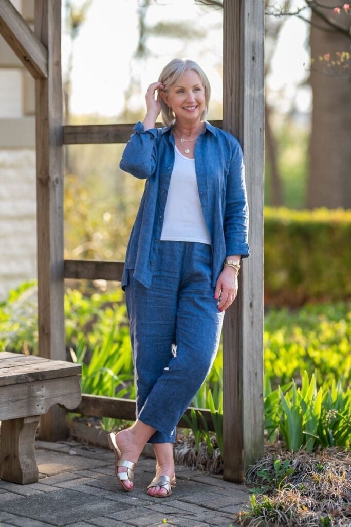 Blue Linen Button Down Shirt + White Tank Top + Blue Linen Trousers + Gold Slide Sandals