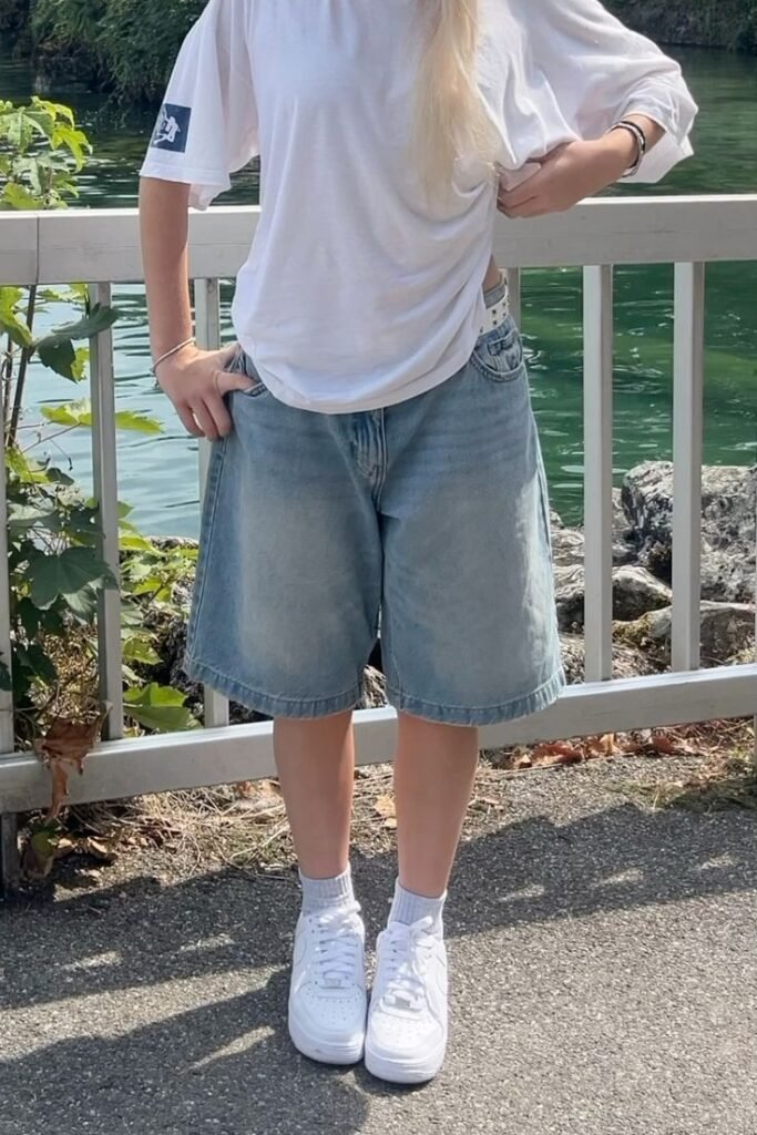 Boxy White Graphic T-Shirt + Light Wash Wide-Leg Denim Shorts + White Sneakers