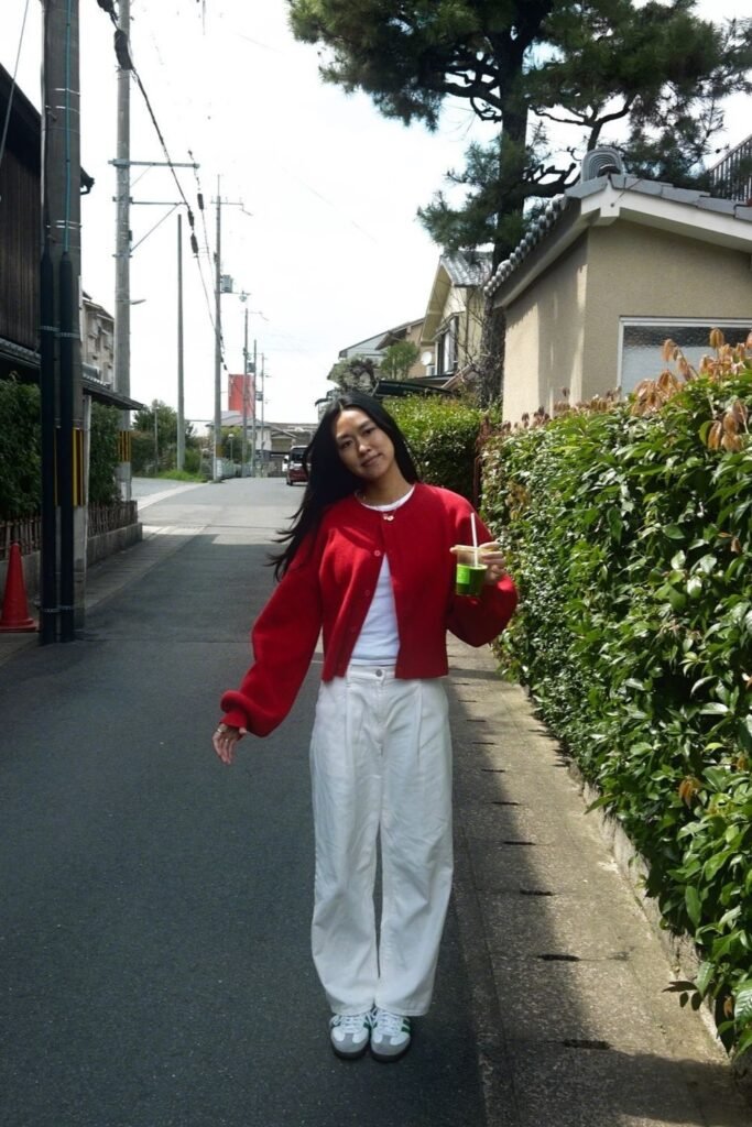 Bright Red Cardigan Sweater + White T Shirt + High Waisted White Trousers + Green Detailed White Sneakers