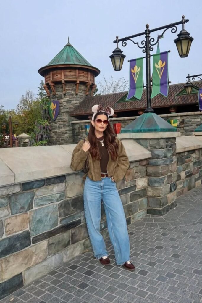 Brown Zip Up Jacket + Brown Mock Neck Top + Light Wash Wide Leg Jeans + Brown Loafers