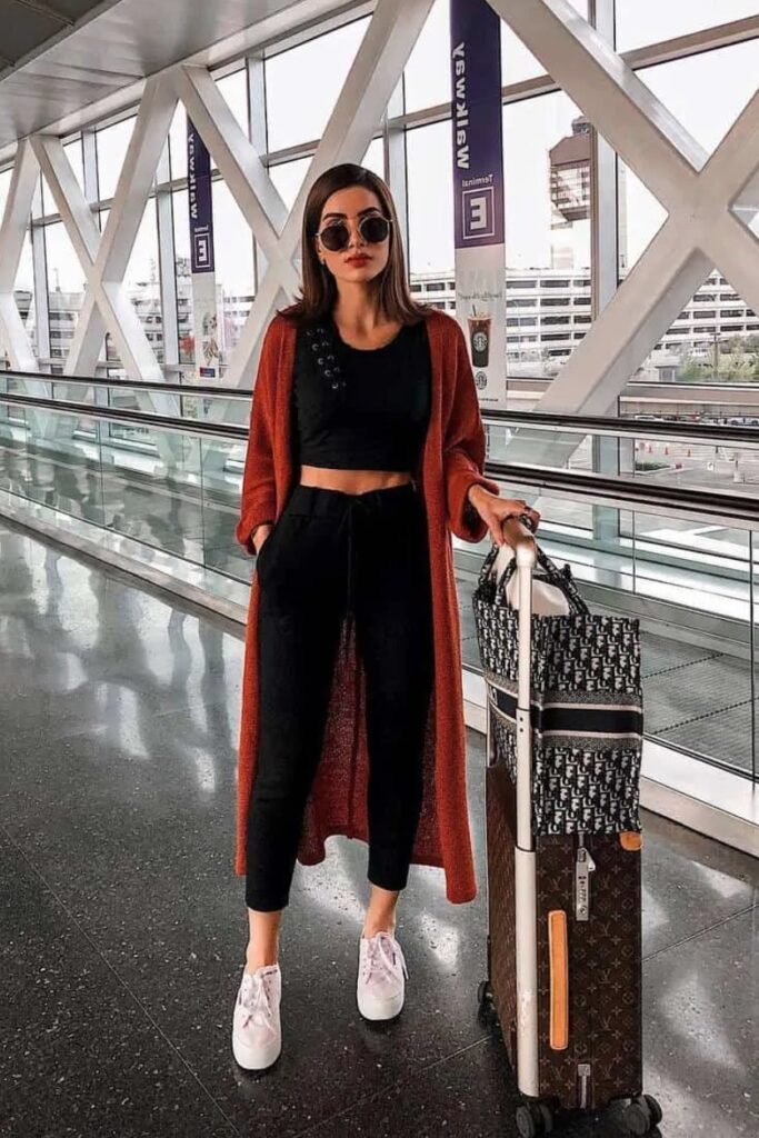 Burnt Orange Long Knit Cardigan + Black Crop Top + Black Cropped Joggers + White Platform Sneakers