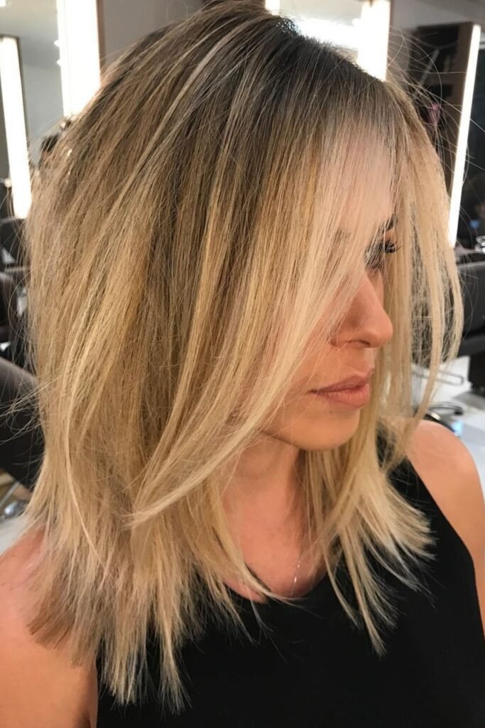 Choppy Medium-Length Cut with Sun-Kissed Balayage