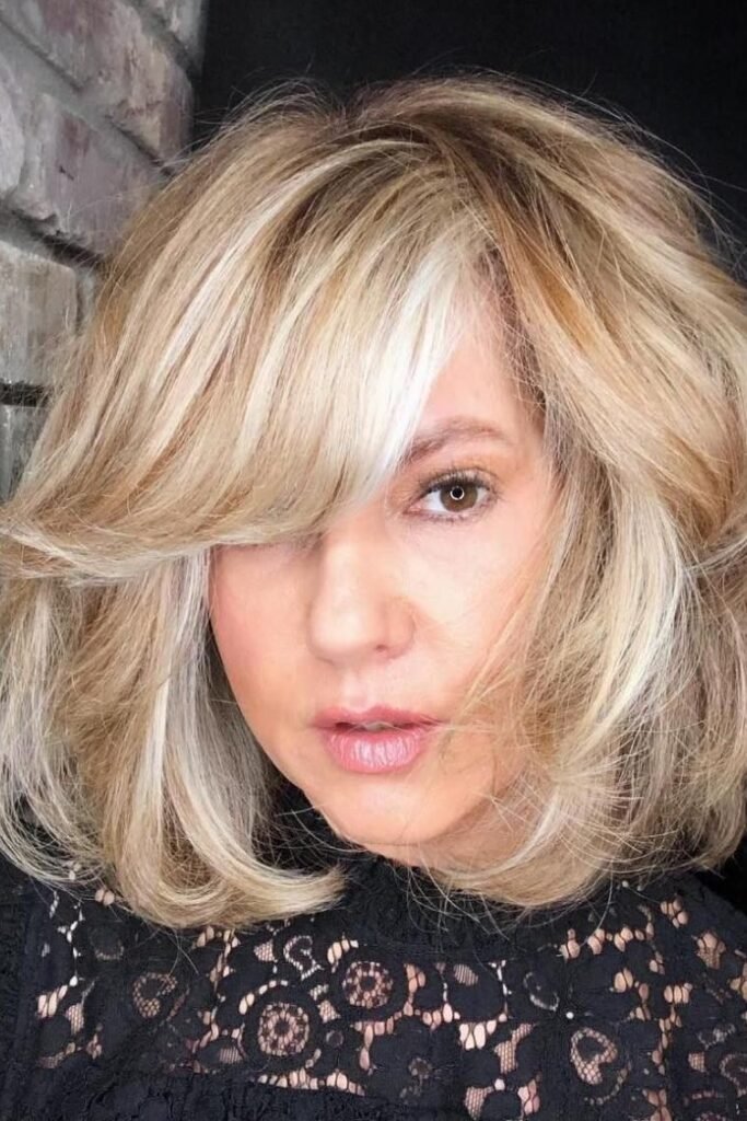 Chunky Textured Bob with Voluminous Side-Swept Bangs