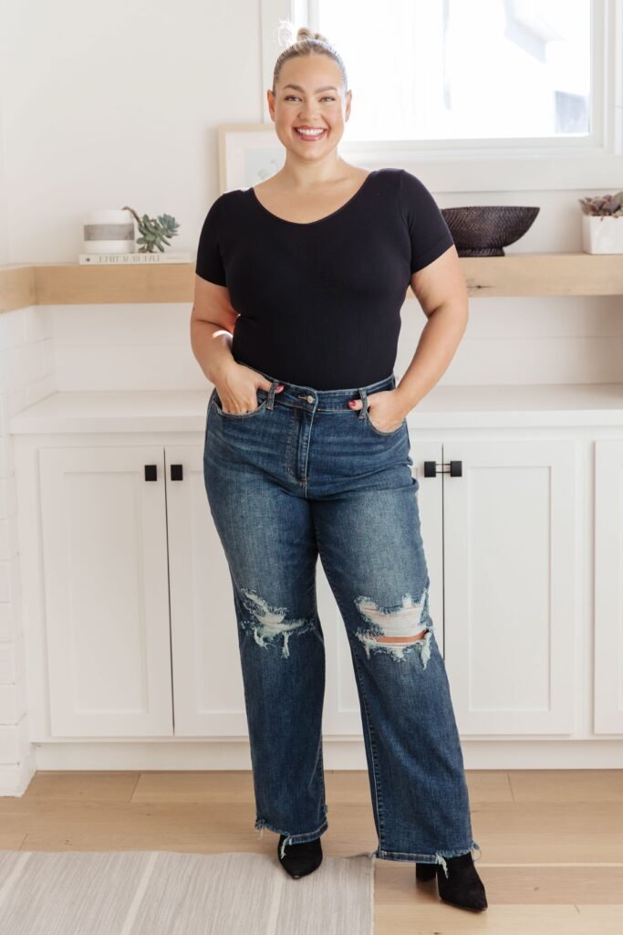 Classic Black Tee + Distressed Straight-Leg Jeans + Black Pointed Boots