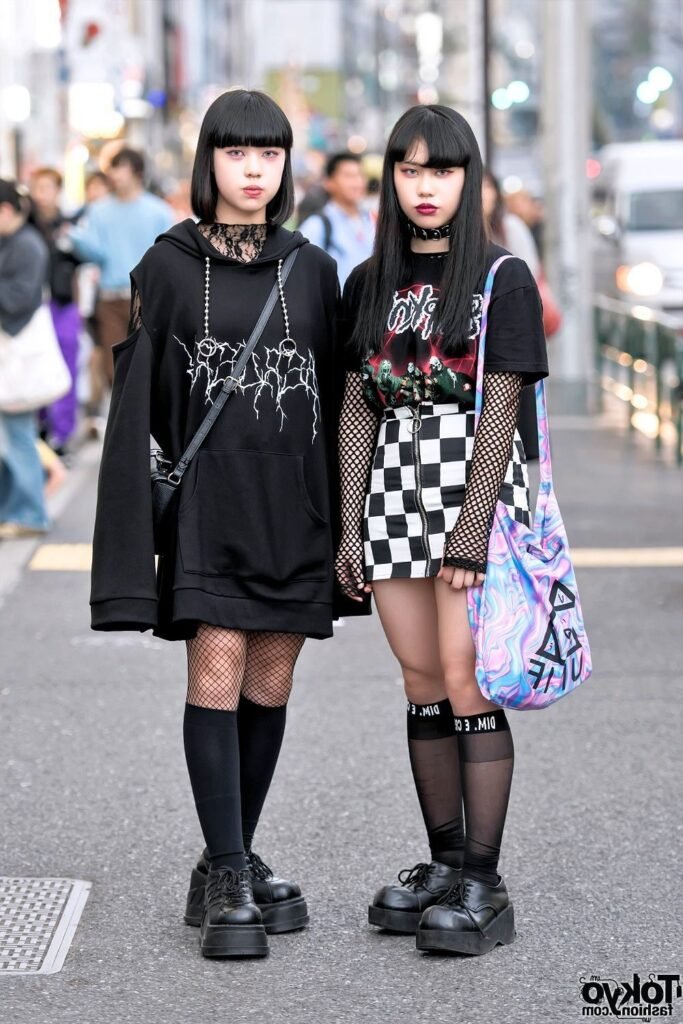Cut Out Gothic Graphic Hoodie + Black Fishnet Tights / Graphic T Shirt + Checkerboard Zipper Mini Skirt + Mesh Arm Warmers + Chunky Black Platform Derby Shoes