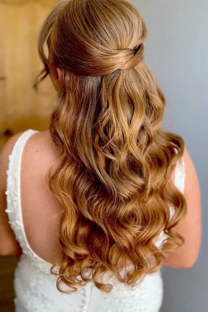 Elegant Half-Up Criss-Cross Twist with Voluminous Auburn Curls