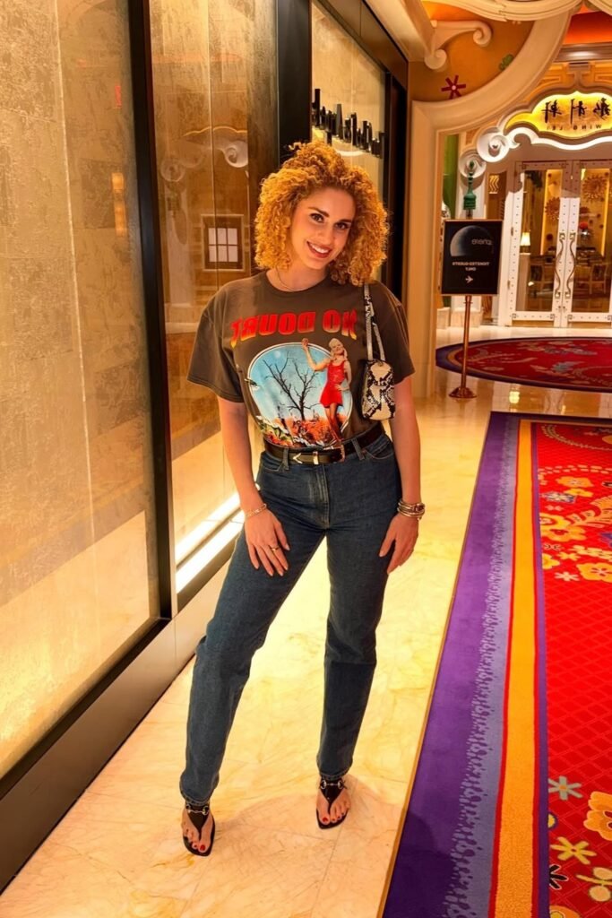 Graphic T Shirt + Dark Blue Jeans + Black Sandals