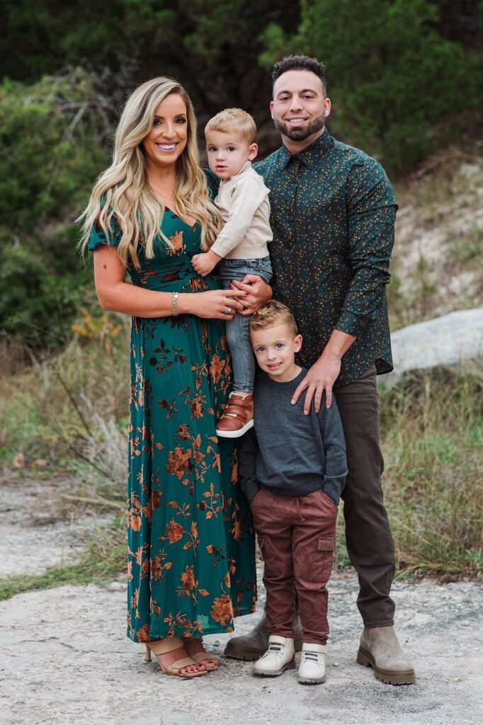 Green Floral Maxi Dress + Tan Mules + Beige Sweater + Grey Jeans + White Sneakers + Charcoal Sweater + Maroon Cargo Pants + White Boots + Dark Green Patterned Shirt + Brown Trousers + Tan Boots