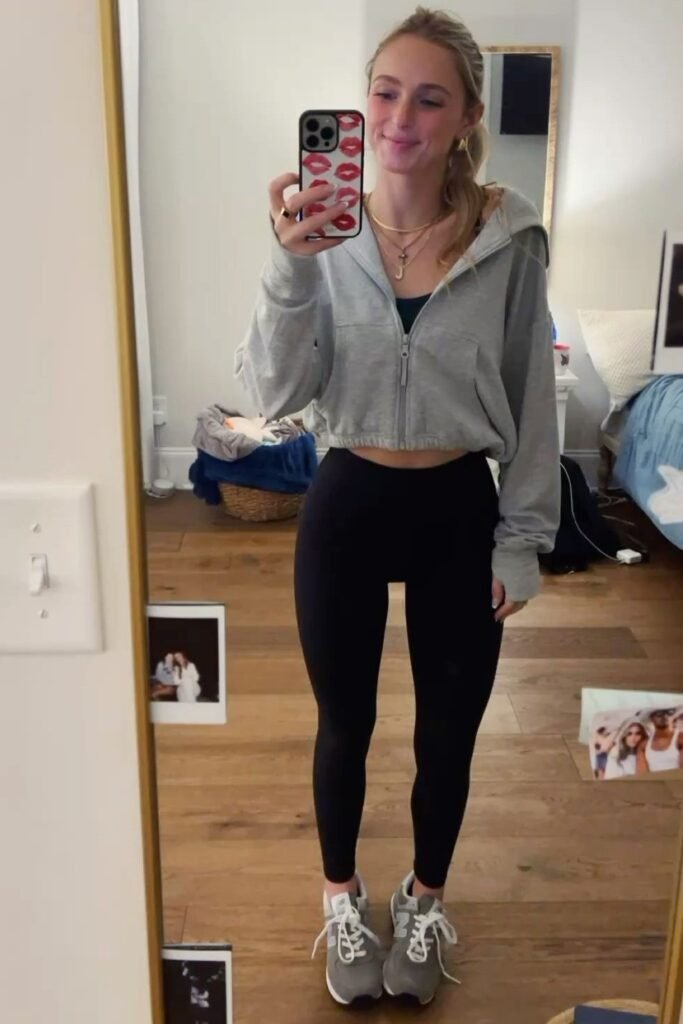 Grey Cropped Zip Up Hoodie + Black Leggings + Grey Sneakers