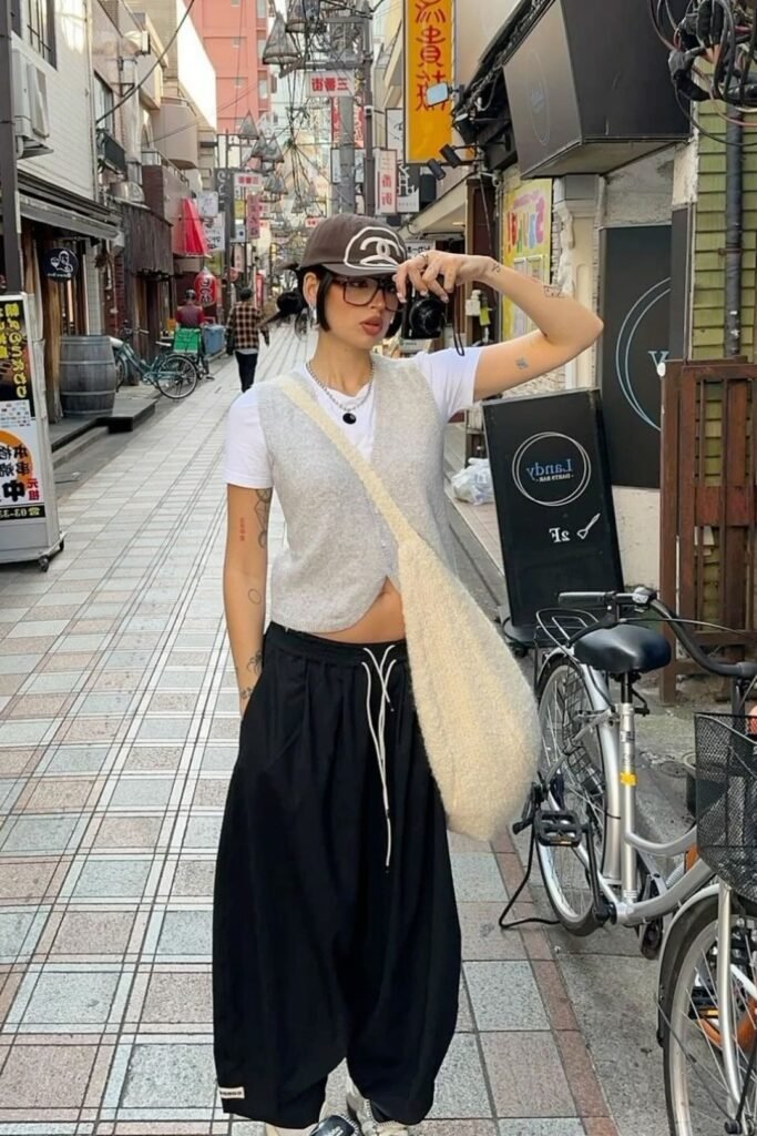 Grey Knit Vest + White T Shirt + Wide Leg Black Trousers + Cream Shoulder Bag